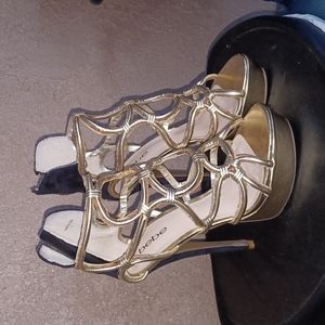 Bebe High gold platform heels